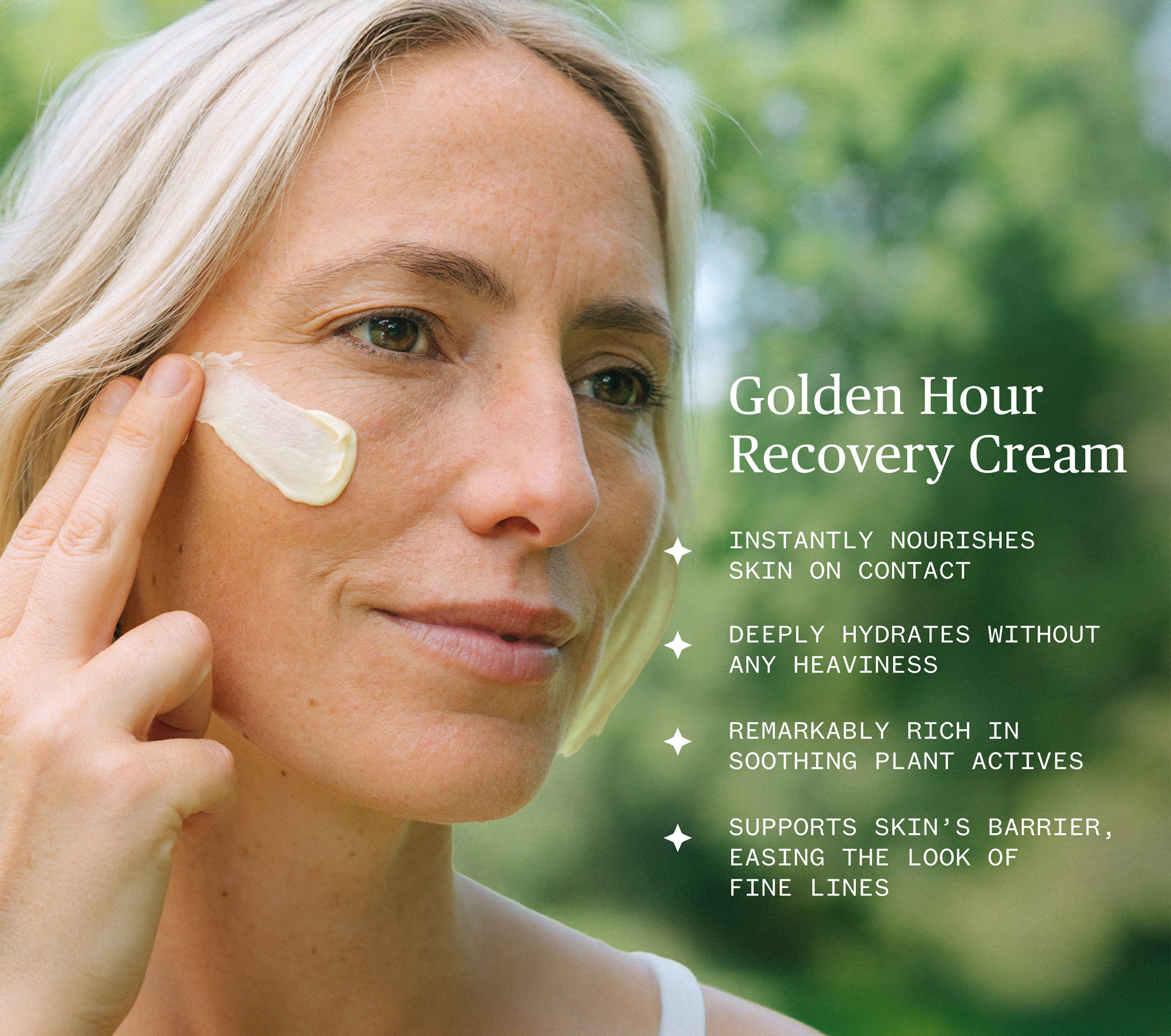 Woman looking to the right slightly smiling while swiping Ursa Major Golden Hour Recovery Cream onto her face.  On the photo is lettering that says Golden Hour Recovery Cream instantly nourishes skin on contact, deeply hydrates without any heaviness, remarkably rich in soothing plant actives, and supports skin's barrier easing the look of fine lines.