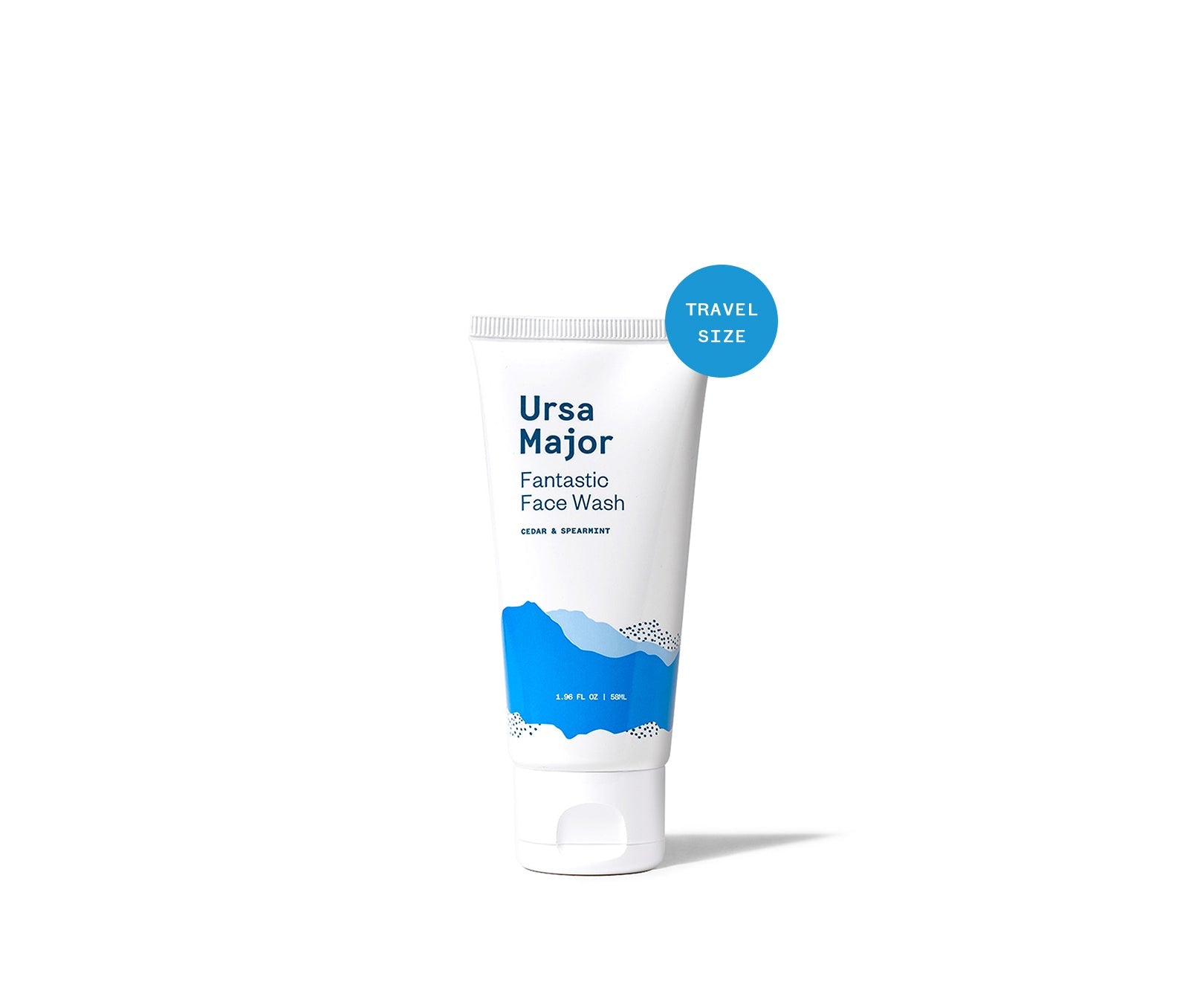 Travel size tube of Ursa Major Fantastic Face Wash. Bottle is white is dark-blue lettering and blue mountains.